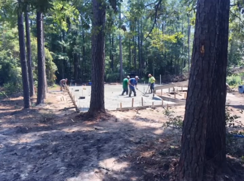 RBM Builders crew pouring a concrete foundation slab
